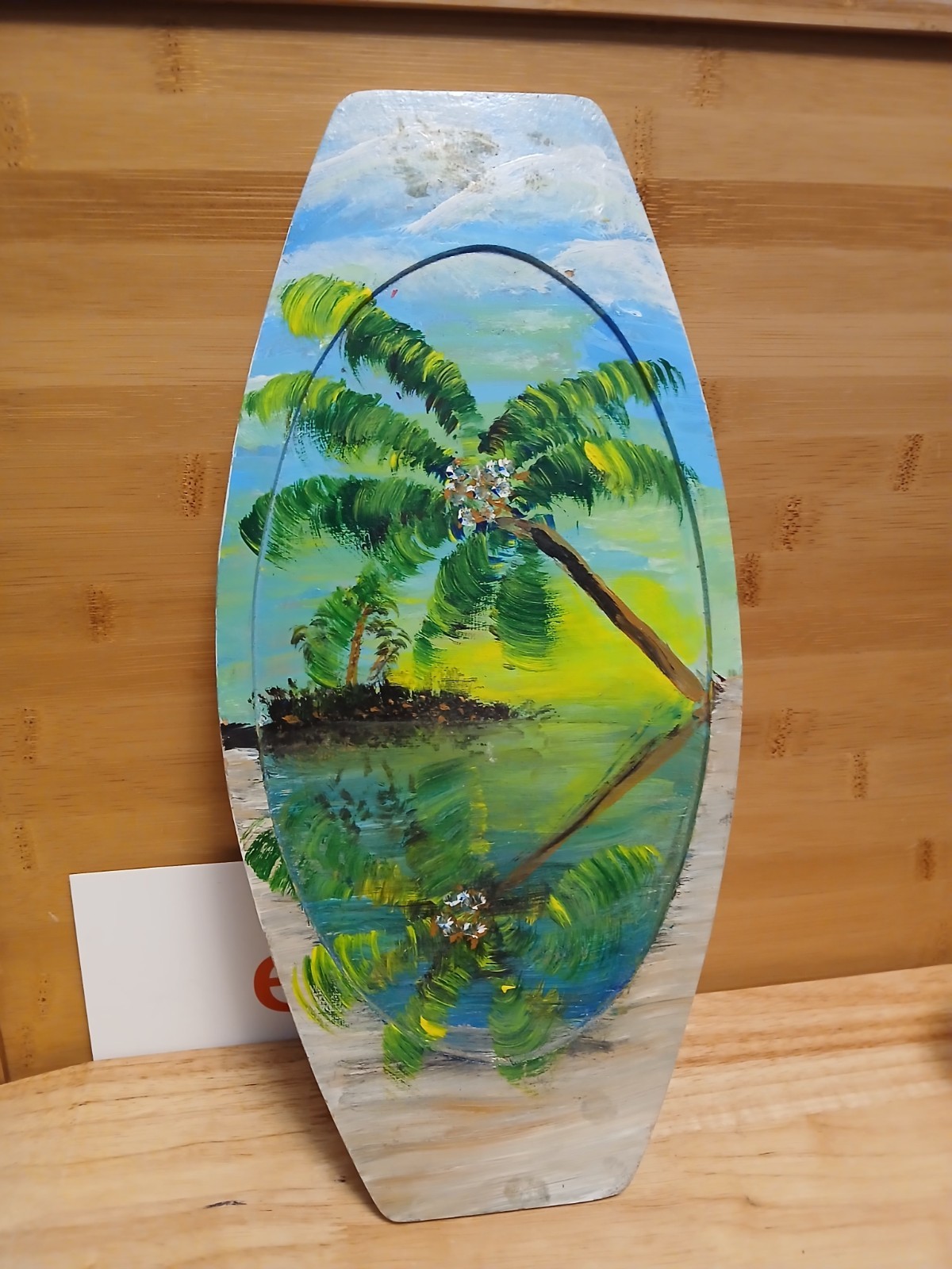 surfboard shaped painted picture of island palm trees water sky 13 x 6 inches