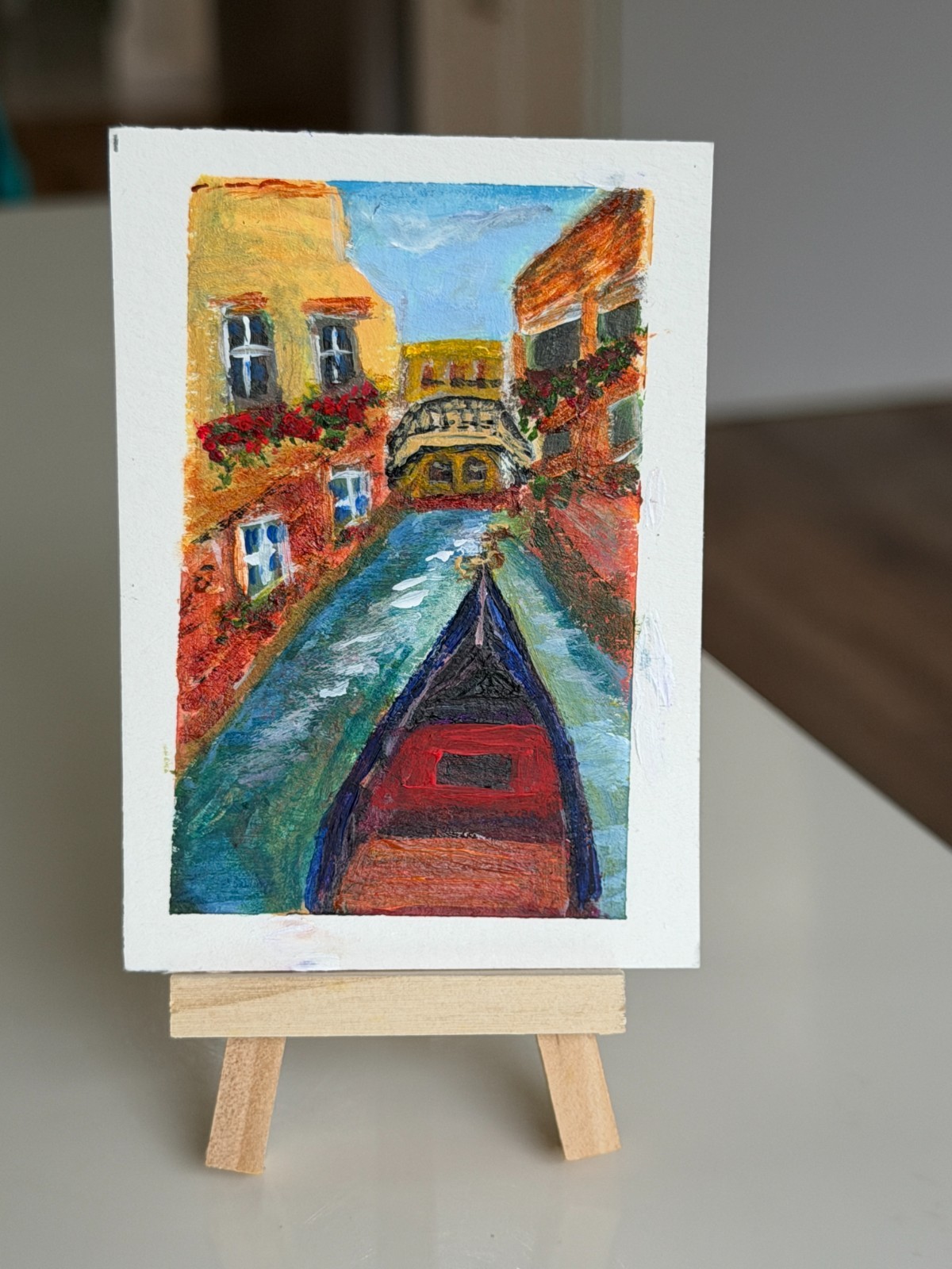 Aceo Italy Venice Canal scene with gondola architecture bridge water vibrant