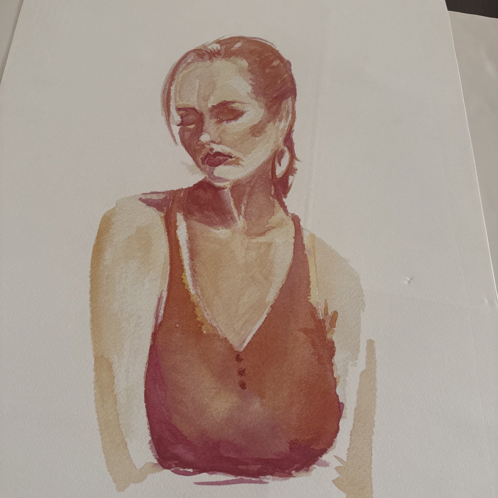Watercolor portrait of a girl in an orange dress.