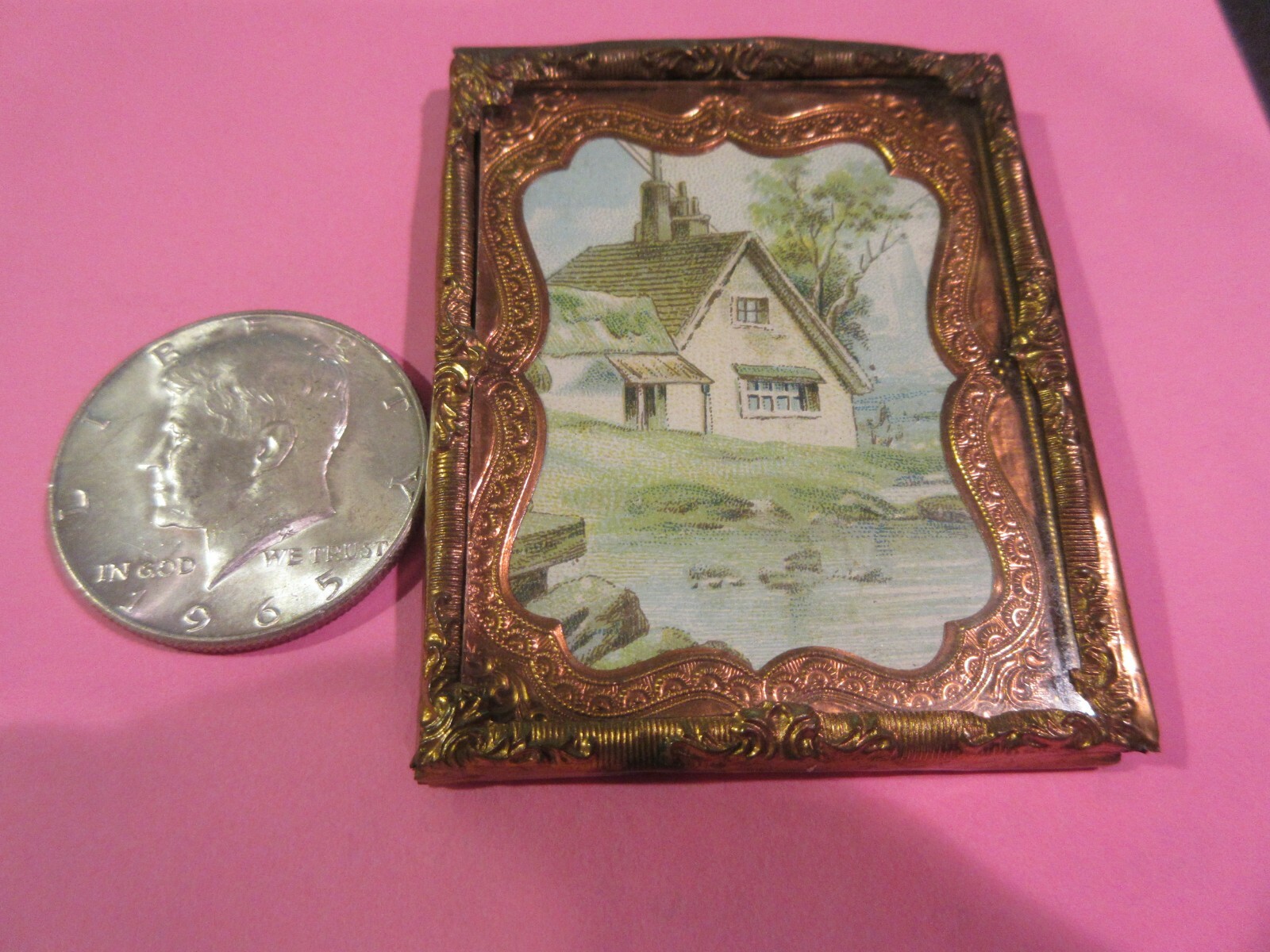 Miniature Art 2″ X 2 1/2″ Appears to be a painting in an old brass holder.