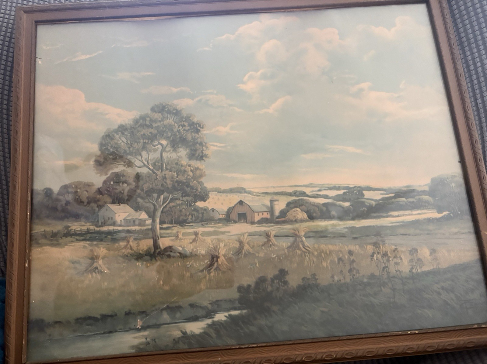 Framed landscape print by the artist William T. Crane, titled “Hay Farm”